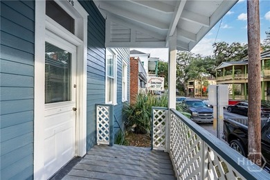 This well-maintained four-unit property offers investors a rare - photo 3