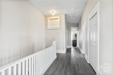 This well-maintained four-unit property offers investors a rare - photo 4