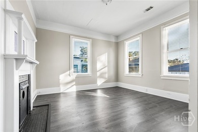This well-maintained four-unit property offers investors a rare - photo 8
