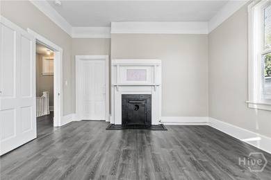 This well-maintained four-unit property offers investors a rare - photo 9