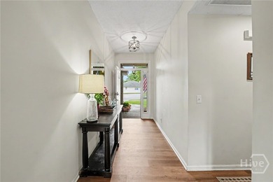 This thoughtfully updated and maintained 4-bedroom ranch sits on - photo 5