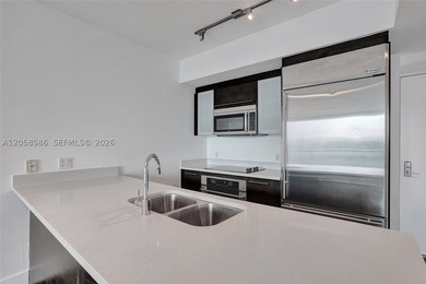 Beautifully renovated condo in the 04 line of 500 Brickell. This - photo 3