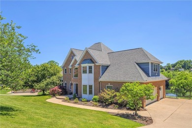 The stately two story residence has a 10 out of 10 view with - photo 4