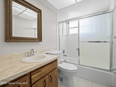 Welcome to this beautifully updated first-floor corner unit in a - photo 13