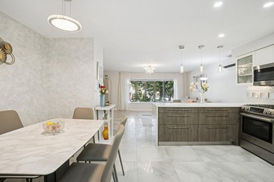 Mint, Turnkey 2-Bedroom Condo with Private Outdoor Space & - photo 2
