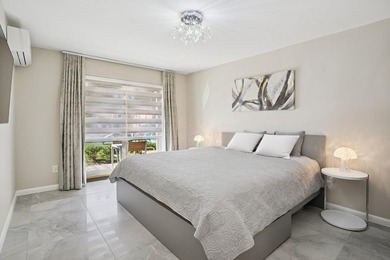 Mint, Turnkey 2-Bedroom Condo with Private Outdoor Space & - photo 5