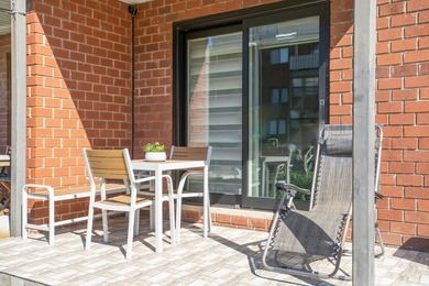 Mint, Turnkey 2-Bedroom Condo with Private Outdoor Space & - photo 9