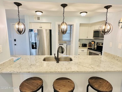 Experience oceanfront living in this beautifully appointed