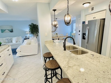 Experience oceanfront living in this beautifully appointed