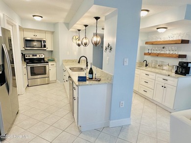 Experience oceanfront living in this beautifully appointed