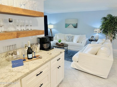 Experience oceanfront living in this beautifully appointed