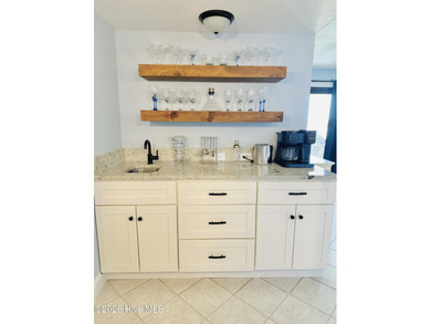 Experience oceanfront living in this beautifully appointed