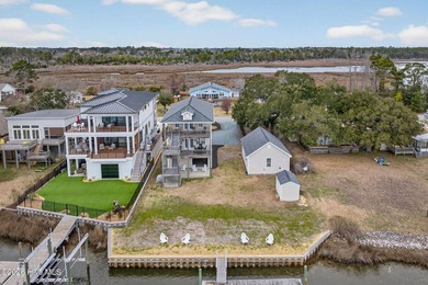 Coastal living and exceptional waterfront access define this