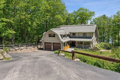 Experience exceptional lakeside living in this custom-built log - photo 12