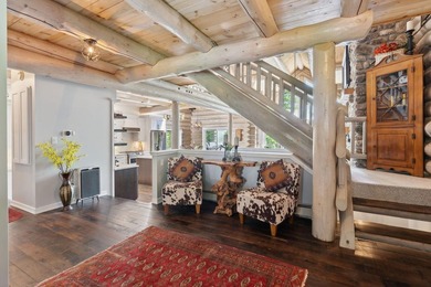 Experience exceptional lakeside living in this custom-built log - photo 15