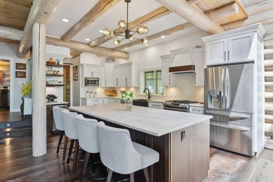 Experience exceptional lakeside living in this custom-built log - photo 17