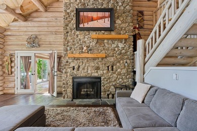 Experience exceptional lakeside living in this custom-built log - photo 22