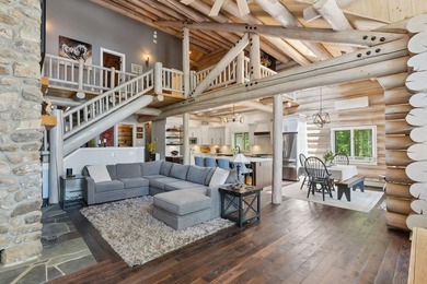 Experience exceptional lakeside living in this custom-built log - photo 23