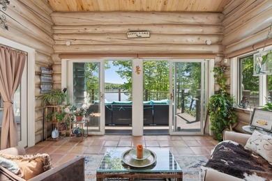 Experience exceptional lakeside living in this custom-built log - photo 24