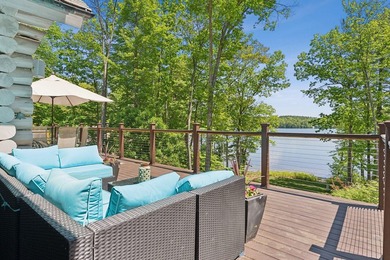 Experience exceptional lakeside living in this custom-built log - photo 25
