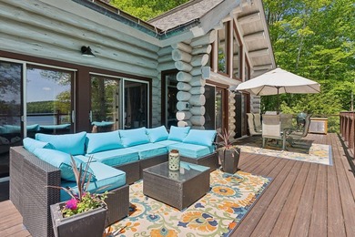 Experience exceptional lakeside living in this custom-built log - photo 26