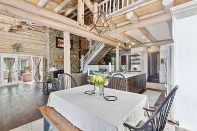 Experience exceptional lakeside living in this custom-built log - photo 28