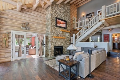 Experience exceptional lakeside living in this custom-built log - photo 29