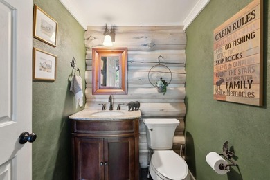 Experience exceptional lakeside living in this custom-built log - photo 31