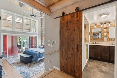 Experience exceptional lakeside living in this custom-built log - photo 32