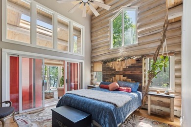 Experience exceptional lakeside living in this custom-built log - photo 33
