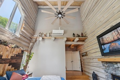 Experience exceptional lakeside living in this custom-built log - photo 34