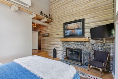 Experience exceptional lakeside living in this custom-built log - photo 35