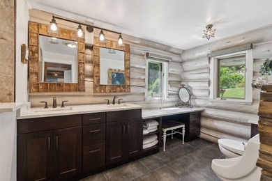 Experience exceptional lakeside living in this custom-built log - photo 36