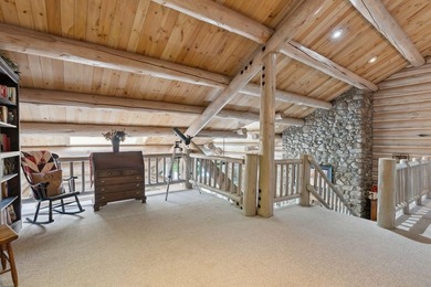 Experience exceptional lakeside living in this custom-built log - photo 39