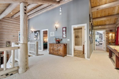Experience exceptional lakeside living in this custom-built log - photo 40