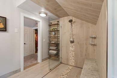 Experience exceptional lakeside living in this custom-built log - photo 45