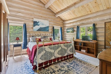Experience exceptional lakeside living in this custom-built log - photo 47