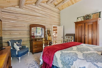 Experience exceptional lakeside living in this custom-built log - photo 48