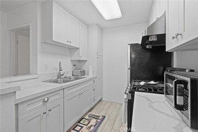 Welcome to a masterfully reimagined, move-in-ready home where - photo 16