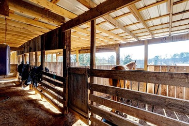Established 27.38-acre equestrian ranch with boarding income - photo 38