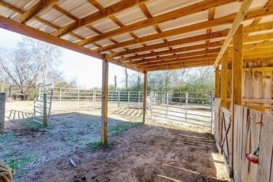 Established 27.38-acre equestrian ranch with boarding income - photo 39