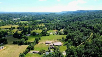 Established 27.38-acre equestrian ranch with boarding income - photo 47