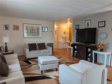 This lovely home is located in a 55+ community where you own - photo 3