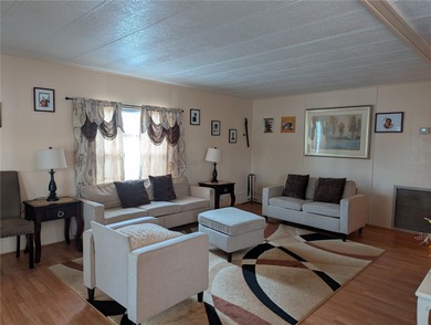 This lovely home is located in a 55+ community where you own - photo 4