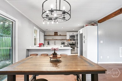 Welcome to 8 Hillyer Drive, a charming 4-bedroom, 2-bathroom - photo 6