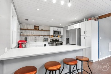 Welcome to 8 Hillyer Drive, a charming 4-bedroom, 2-bathroom - photo 7