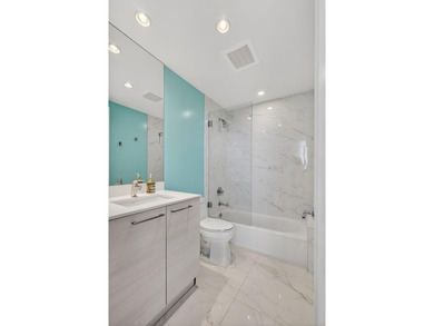 Experience resorty style waterfront living in the most sought - photo 47