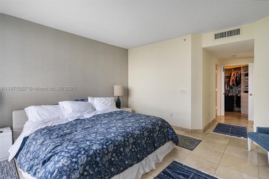 This beautiful furnished residence features an open kitchen with - photo 12