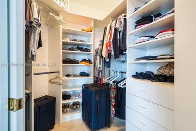 This beautiful furnished residence features an open kitchen with - photo 14