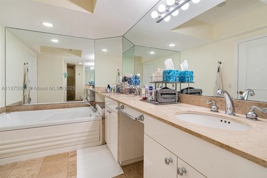 This beautiful furnished residence features an open kitchen with - photo 15
